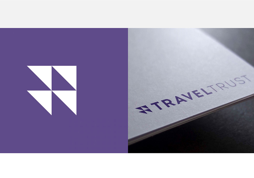 Traveltrust国际旅游公司品标志设计.jpg